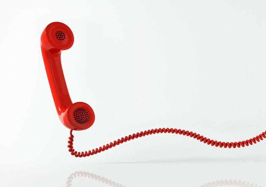 フランスの白地に赤い電話。