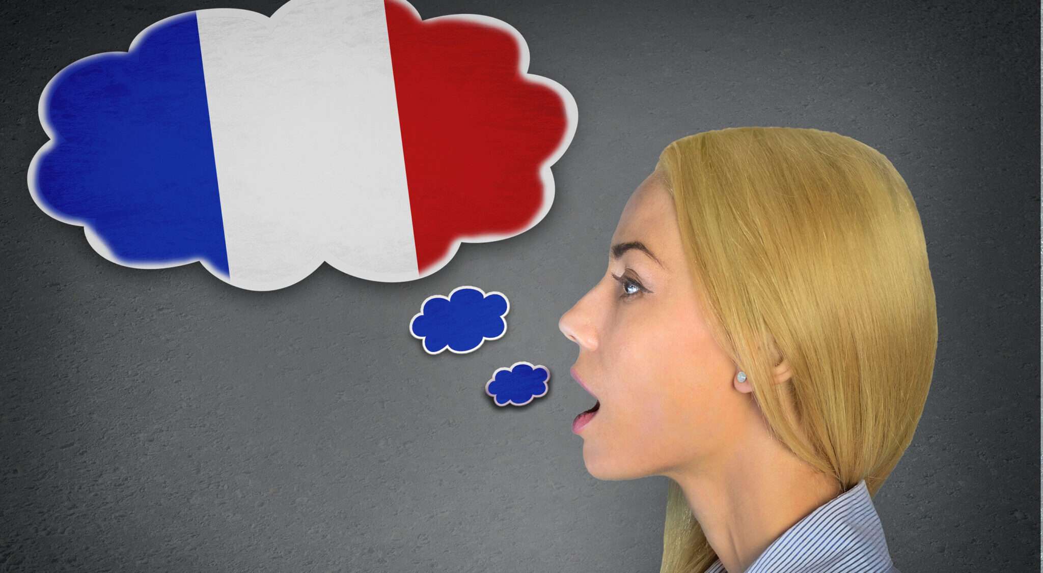 フランスの旗が描かれた思考バブルを持つ女性。